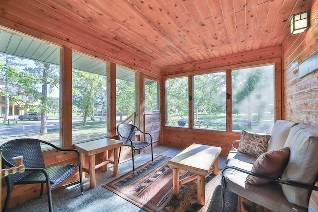 sunroom / solarium featuring wood ceiling