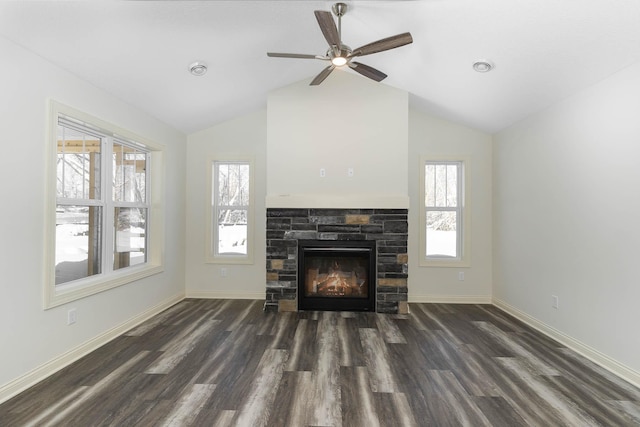 unfurnished living room featuring a fireplace, ceiling fan, vaulted ceiling, and dark hardwood / wood-style floors