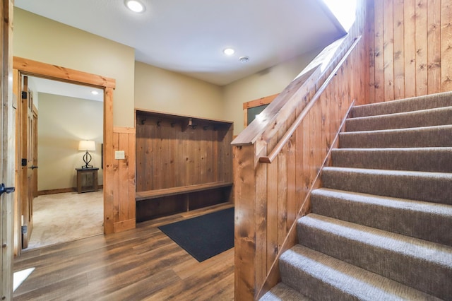 staircase featuring hardwood / wood-style flooring