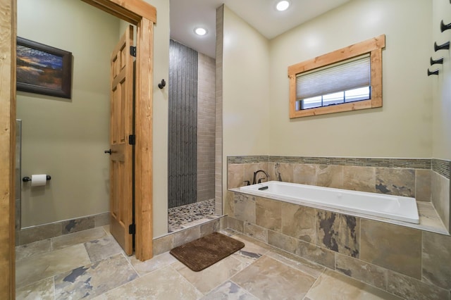 bathroom with independent shower and bath