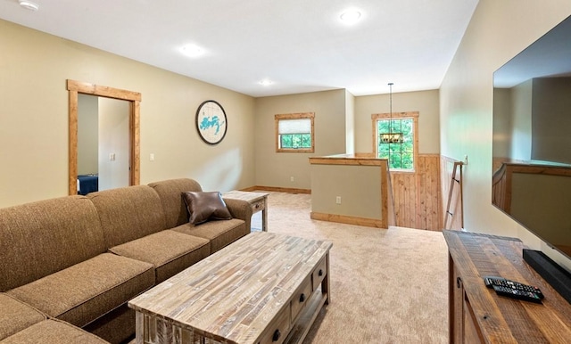 living room featuring light carpet and recessed lighting