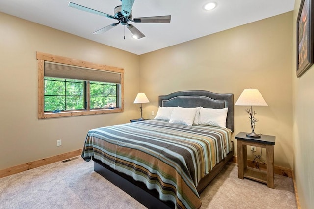 carpeted bedroom featuring baseboards, ceiling fan, visible vents, and recessed lighting