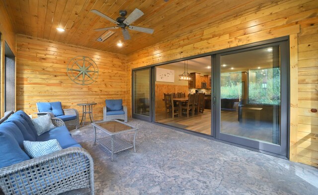 view of patio / terrace featuring ceiling fan