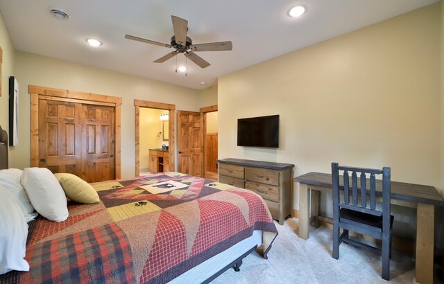 carpeted bedroom with ceiling fan