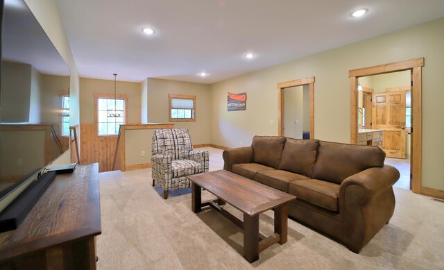 living room featuring light carpet