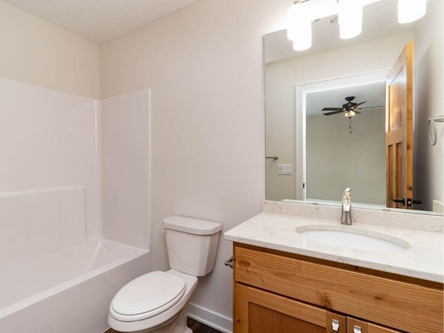 full bathroom featuring ceiling fan, vanity, toilet, and shower / bathtub combination