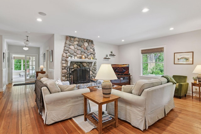20390 Linwood Rd, Deephaven, MN 55331 - living room with hardwood / wood-style flooring, a fireplace, and recessed lighting