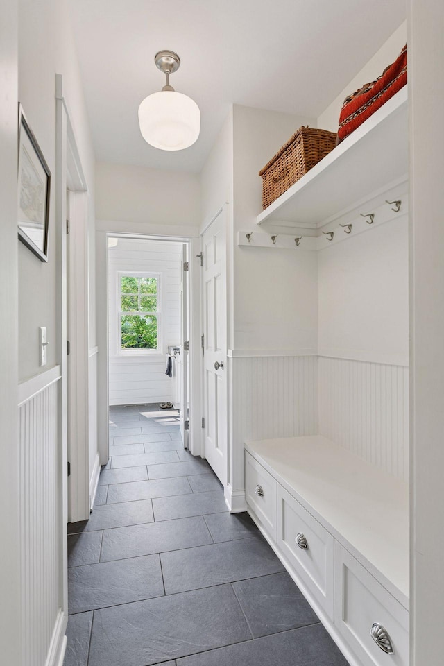 20390 Linwood Rd, Deephaven, MN 55331 - mudroom with wainscoting and dark tile patterned flooring