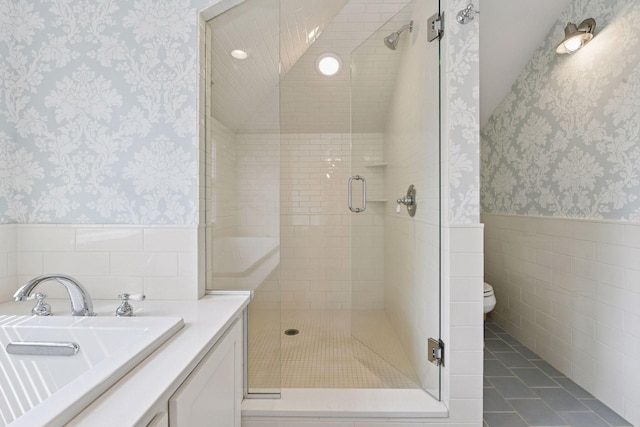20390 Linwood Rd, Deephaven, MN 55331 - full bath featuring wallpapered walls, wainscoting, tile walls, a stall shower, and tile patterned flooring