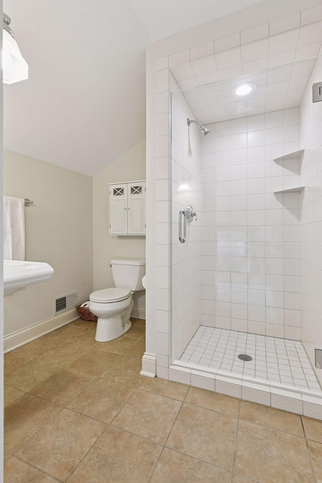 20390 Linwood Rd, Deephaven, MN 55331 - full bath featuring a stall shower, vaulted ceiling, and tile patterned flooring