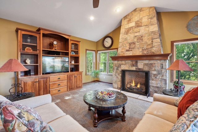 living room featuring ceiling fan, high vaulted ceiling, light carpet, and a fireplace