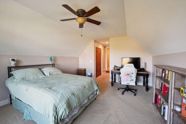 carpeted bedroom with lofted ceiling and ceiling fan