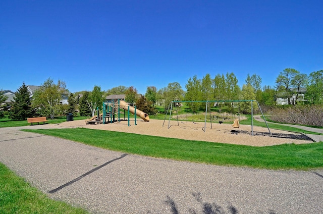 view of jungle gym featuring a yard