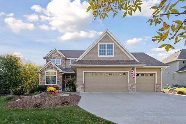 craftsman house with stone siding, driveway, and roof with shingles