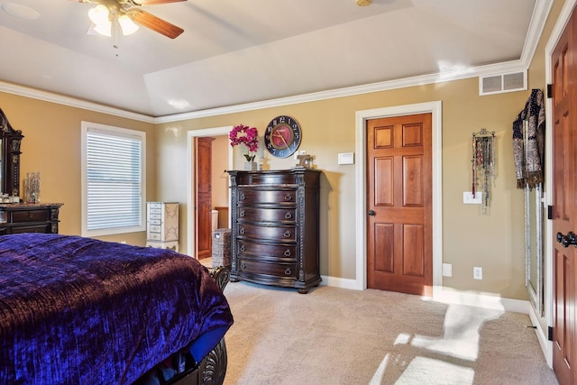 carpeted bedroom featuring visible vents, lofted ceiling, crown molding, and baseboards