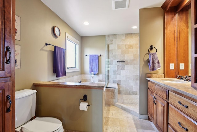 bathroom with toilet, recessed lighting, visible vents, and walk in shower