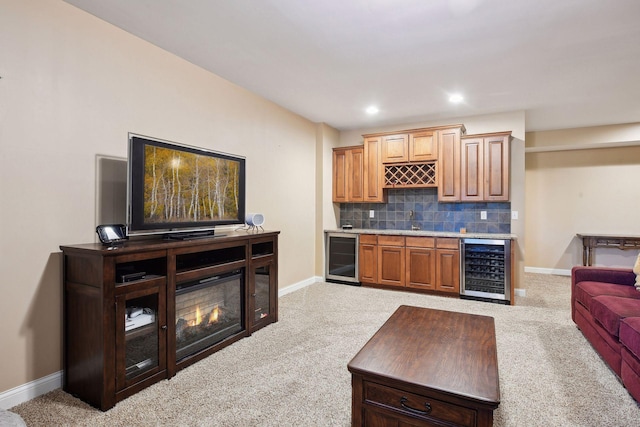 bar with wet bar, beverage cooler, light colored carpet, and backsplash