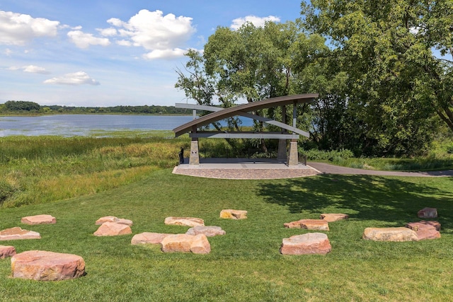 view of yard with a gazebo and a water view