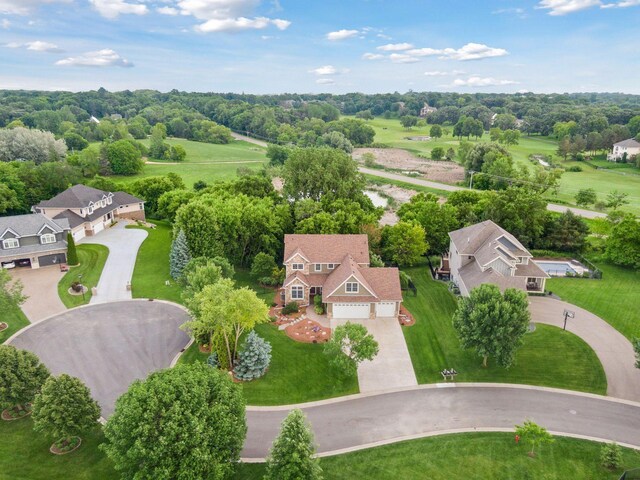 8615 Kelzer Pond Dr, Victoria, MN 55386 - aerial perspective of suburban area with a tree filled landscape