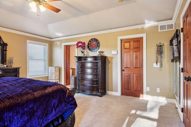 8615 Kelzer Pond Dr, Victoria, MN 55386 - carpeted bedroom featuring ornamental molding, a tray ceiling, and ceiling fan