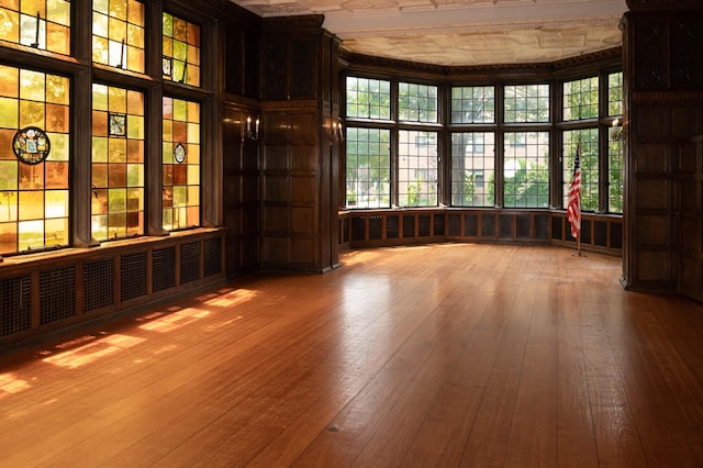 unfurnished room featuring wood-type flooring