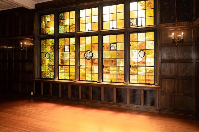 interior space with wood-type flooring and beamed ceiling