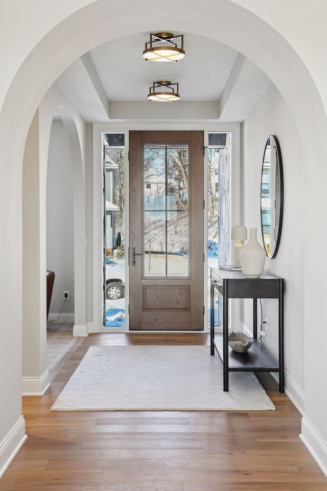 entrance foyer with light hardwood / wood-style flooring