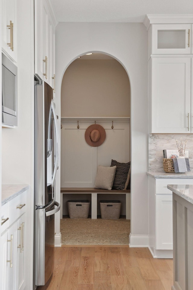 mudroom with light wood-type flooring