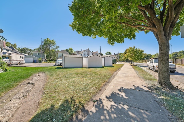 view of yard featuring a garage