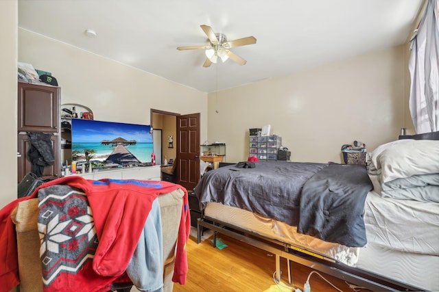 bedroom featuring ceiling fan and light hardwood / wood-style floors