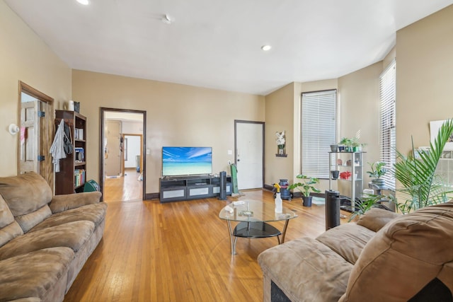 living room with light hardwood / wood-style floors