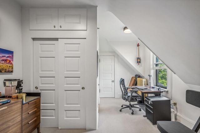 home office with light colored carpet