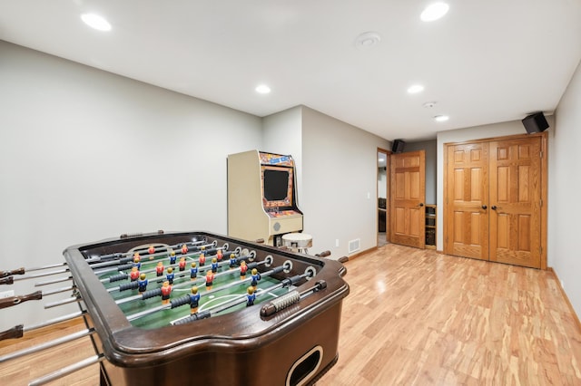 playroom with light wood-type flooring