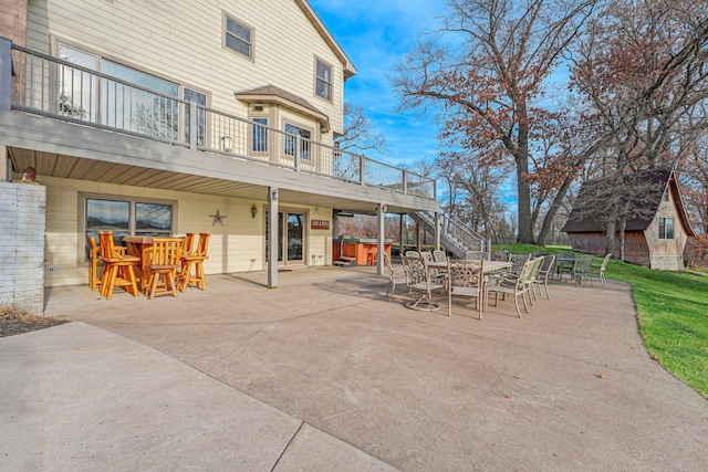 view of patio / terrace featuring a hot tub