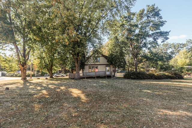 view of front of house featuring a wooden deck