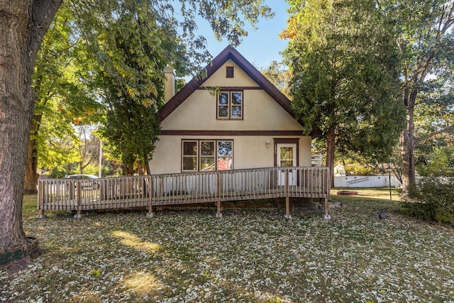 view of front facade featuring a wooden deck