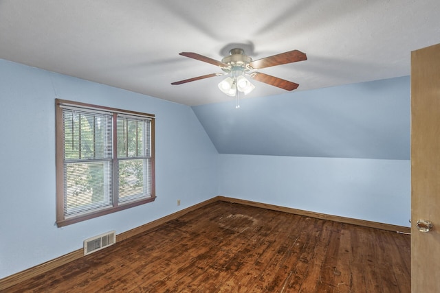 additional living space with ceiling fan, lofted ceiling, and hardwood / wood-style floors