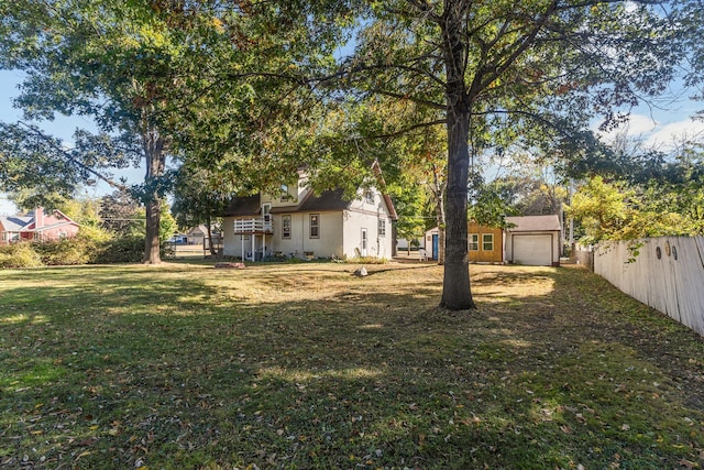 view of yard with a garage