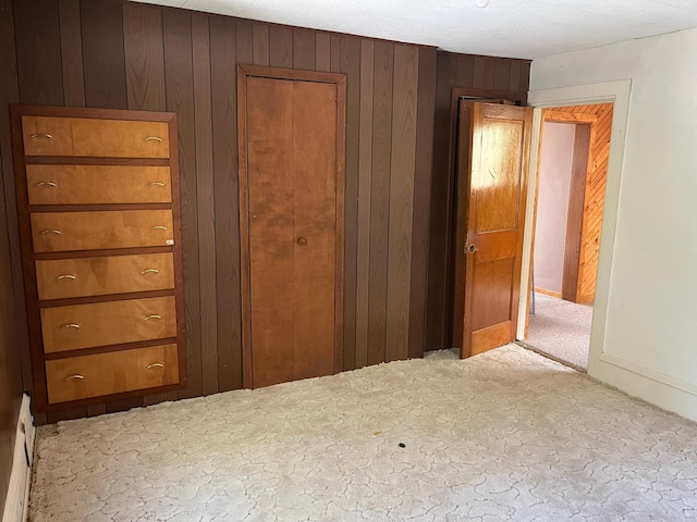 unfurnished bedroom with a textured ceiling