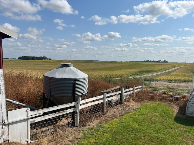 view of yard with a rural view