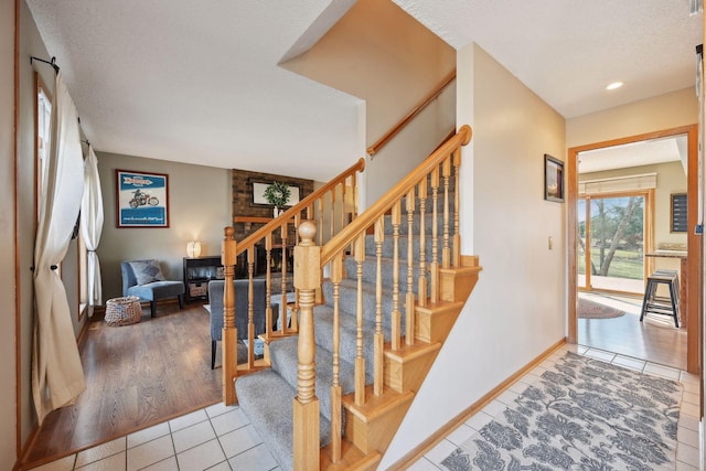 staircase with tile patterned flooring