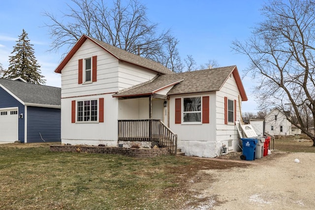 view of front facade with a front lawn and a garage