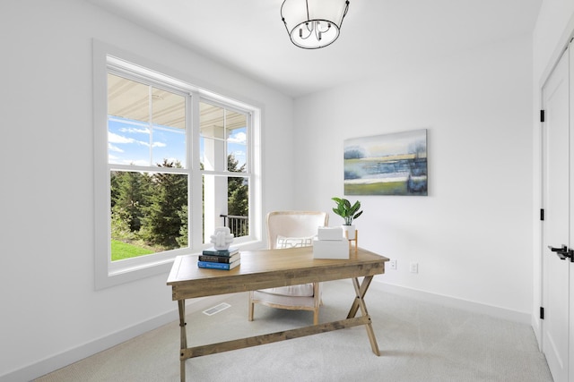 home office featuring light carpet and plenty of natural light