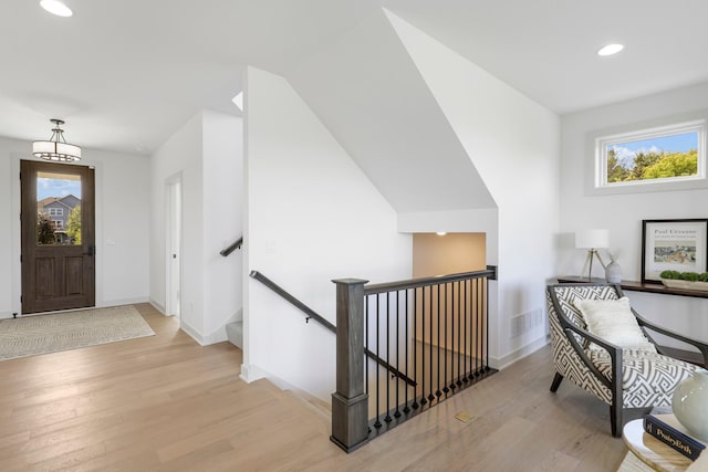 entryway with light hardwood / wood-style flooring and a wealth of natural light