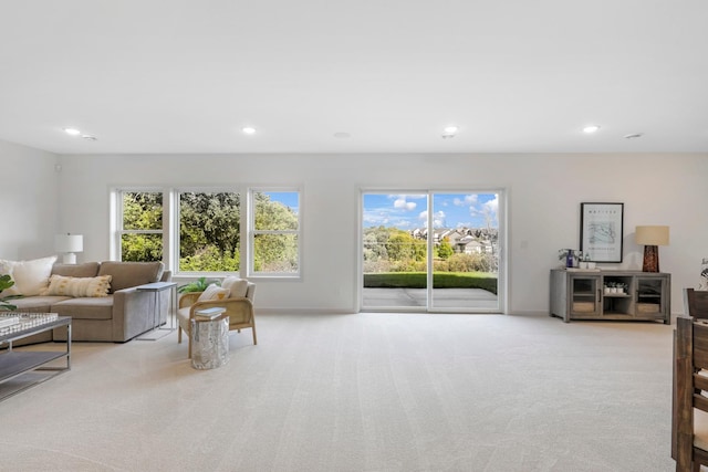 living room featuring light colored carpet