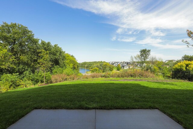 view of yard with a water view