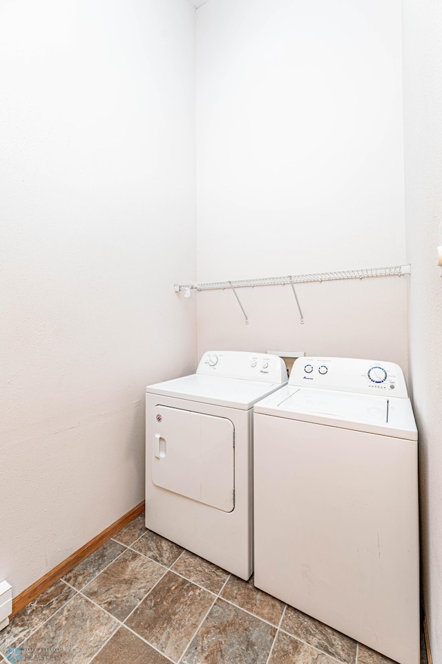 laundry area with separate washer and dryer