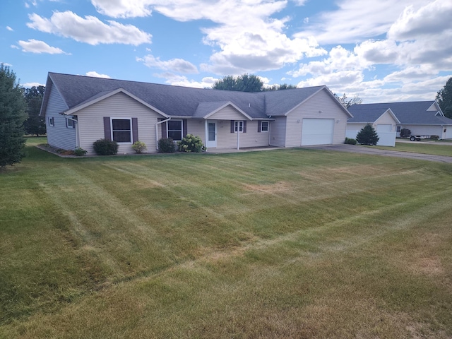 ranch-style home with a front yard and a garage