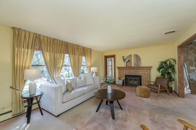 carpeted living room featuring a brick fireplace