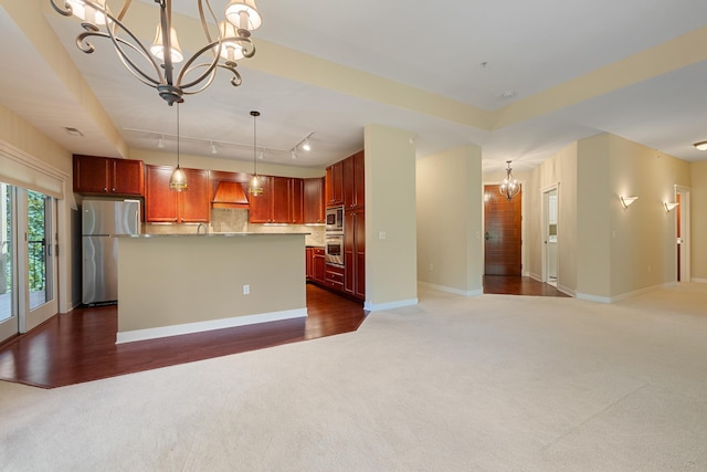 kitchen with an inviting chandelier, a center island, dark wood-type flooring, and premium range hood